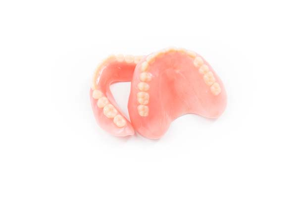 Tips For Comfort And Secure Attachment For New Dentures